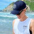 Navy 5 Panel Cap with White Thread D&H Icon, modelled by Ash